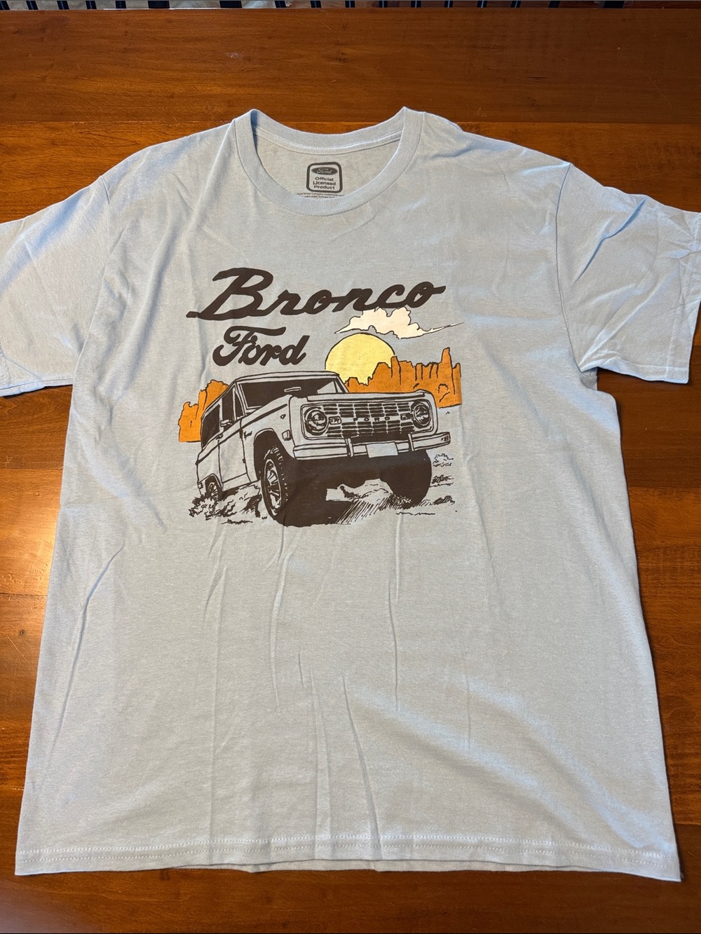 Ford Bronco Graphic Tee - Light Blue with Orange and Yellow Sunset